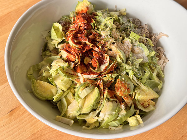 Seasoned vegetables for potato and Brussels sprouts hash.