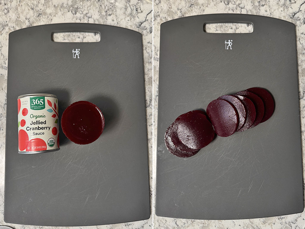 Jellied cranberry sauce next to a can on the left, and sliced jellied cranberry sauce on a cutting board on the right.