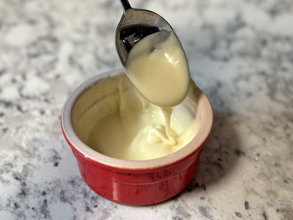 White chocolate melted in a ramekin.