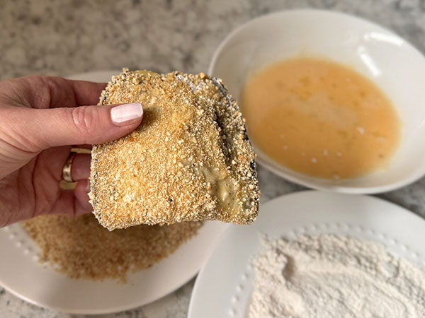 Breaded eggplant pocket with filling inside.