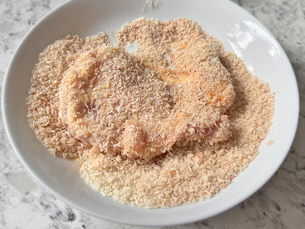 Boneless skinless chicken thigh coated in Panko breadcrumbs and seasonings mixture.