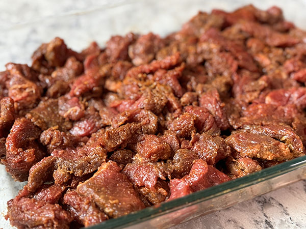 Top sirloin beef strips coated with shawarma marinade.