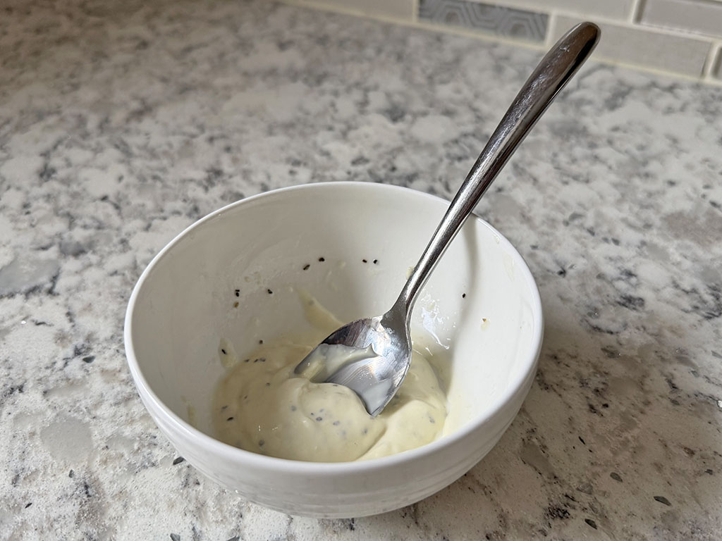 Lemon-garlic mayo in a small bowl.