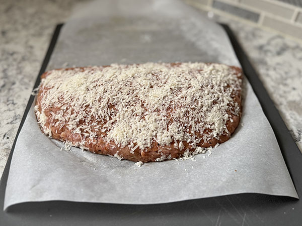 Turkey pocket topped with Parmesan cheese for crust.