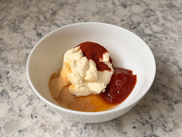 Fried chicken dipping sauce ingredients in a small bowl.