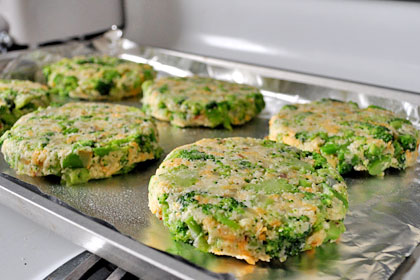 Baked Broccoli Patties photo instruction 6 Shaped broccoli patties on a foil lined baking sheet ready for oven.